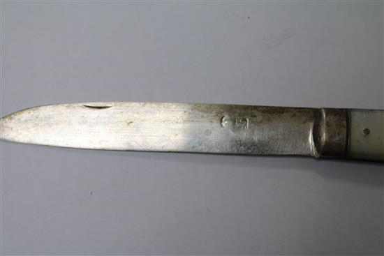 A silver bracelet, silver napkin ring, fruit knife and other items.